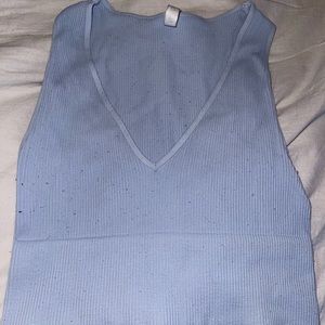 tight fit tank top from Nikibiki. ONE SIZE FITS ALL.